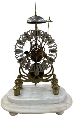 Lot 116 - A late 19th century brass skeleton clock,...