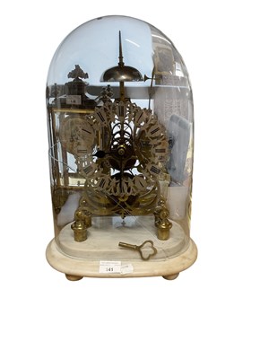 Lot 141 - A late 19th century brass skeleton clock,...