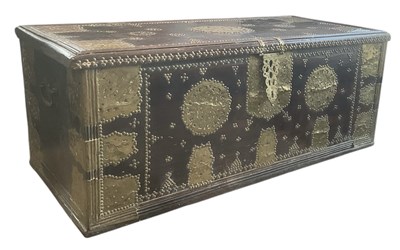 Lot 28 - A 19th century African hardwood Zanzibar chest,...