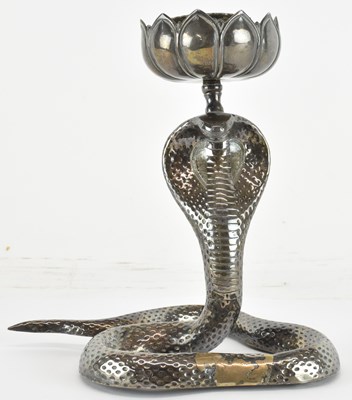 Lot 1006 - A silver plated novelty candlestick, modelled...