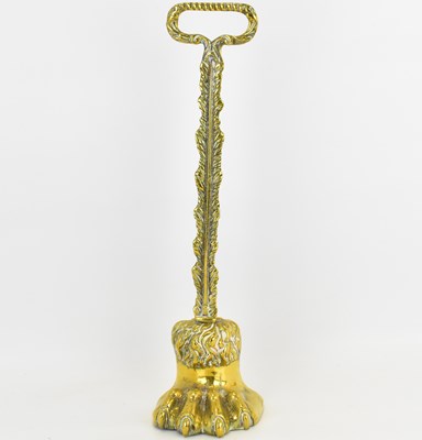 Lot 360 - A 19th century brass doorstop modelled as a...