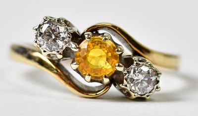 Lot 784 - A 9ct yellow gold ring set with a central...