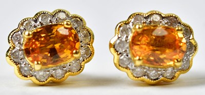 Lot 888 - A pair of 18ct yellow gold yellow stud...