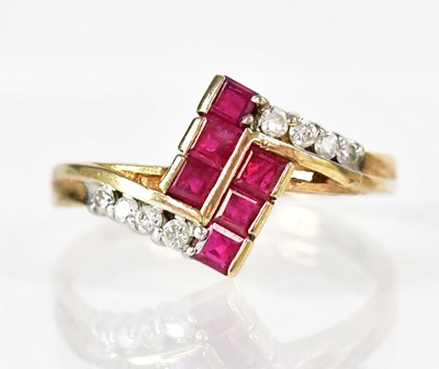 Lot 783 - A 9ct yellow gold ring set with six square...