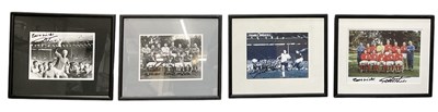 Lot 477 - A group of four framed photographs in black...