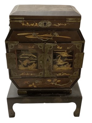 Lot 829 - An early 20th century Japanese black lacquered...