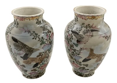 Lot 828 - A pair of modern Chinese hand painted floral...