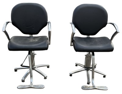 Lot 26 - A pair of modern contemporary black leather...