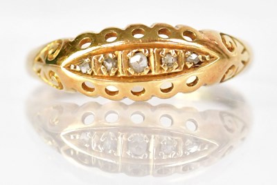 Lot 761 - An 18ct yellow gold ring with pierced...