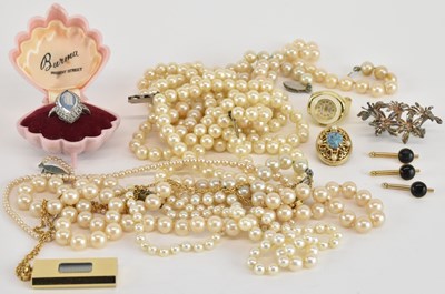 Lot 1654 - A small group of costume jewellery including...