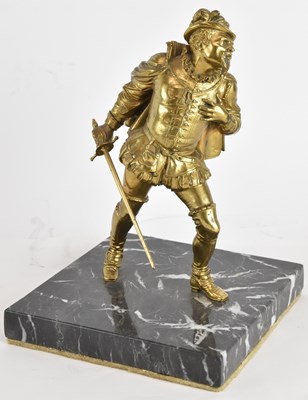 Lot 742 - A gilded figure of a cavalier, mounted on a...