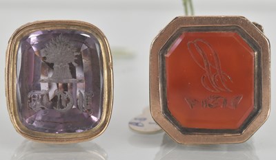 Lot 1433 - Two 19th century yellow metal framed fobs,...