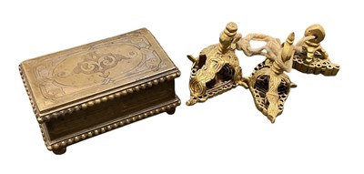 Lot 341 - A graduated set of three unusual gilt metal...