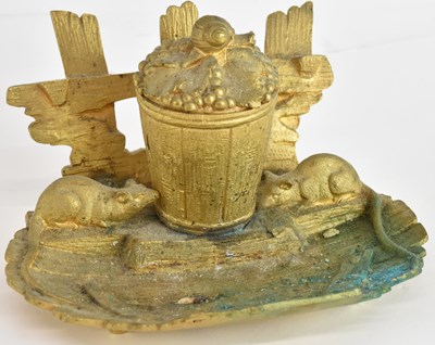 Lot 758 - A gilded bronzed inkwell, modelled as a bin...