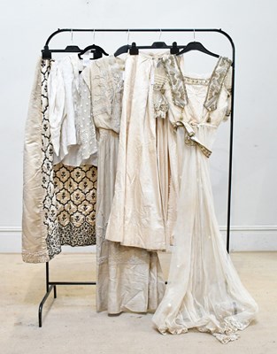 Lot 733 - An Edwardian lace cream full length evening...