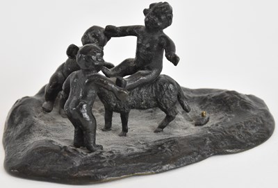 Lot 749 - A small late 19th century bronze figure group...