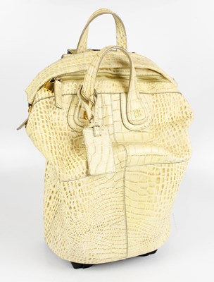 Lot 596 - GIVENCHY; a cream and beige crocodile embossed...