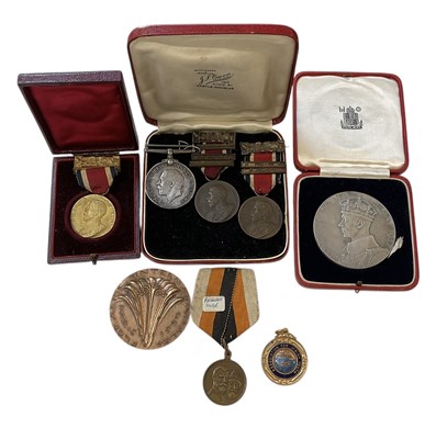 Lot 406 - A WWI medal awarded to 25558 Gnr. E. J....