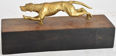 Lot 756 - A gilded bronzed figure of a hound running,...