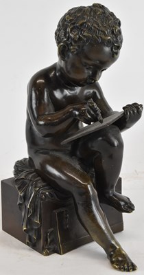 Lot 738 - A late 19th century bronze figure of a cherub,...