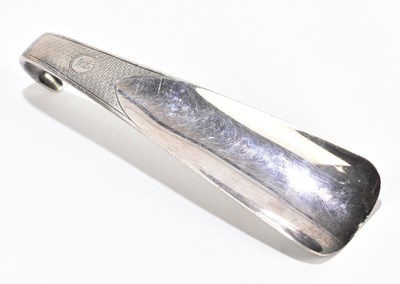 Lot 1153 - CHARLES STUART HARRIS; a George V hallmarked silver shoe horn