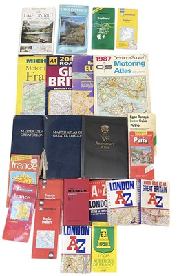 Lot 525 - A collection of vintage travel guides, road...
