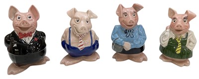 Lot 662 - WADE; a collection of four NatWest piggy banks...