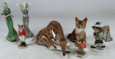 Lot 228 - A group of mixed ceramic figures, comprising a...