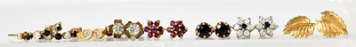 Lot 895 - Five pairs of 9ct gold stud earrings,...