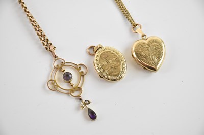 Lot 379 - A 9ct yellow gold heart shaped locket on 9ct...