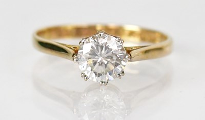 Lot 785 - A 9ct yellow gold ring set with a cubic...