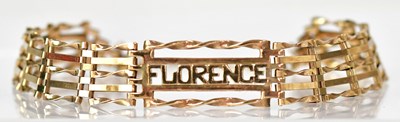 Lot 824 - A yellow metal five-bar gate bracelet, with...