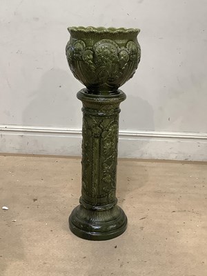 Lot 1618 - BERMANTOFTS; an art pottery green glazed...
