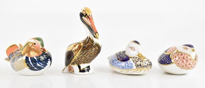 Lot 1541 - ROYAL CROWN DERBY; four bird form paperweights,...