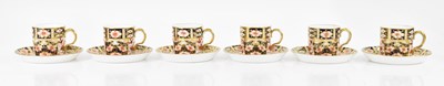 Lot 1668 - ROYAL CROWN DERBY; six coffee cans and saucers...