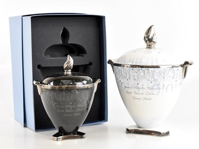 Lot 1599 - WEDGWOOD; two twin handled lidded pedestal...