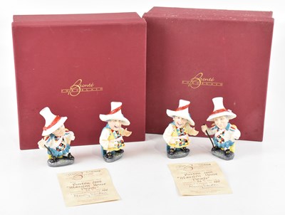 Lot 1535 - BRONTE PORCELAIN; two cased sets of figures,...