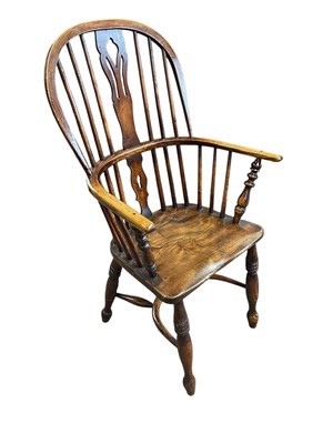 Lot 2058 - A 19th century beech and ash country Windsor...