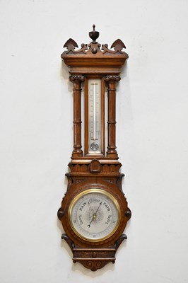 Lot 2238 - A Victorian carved oak aneroid barometer, with...