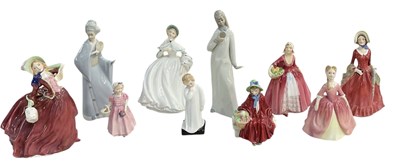 Lot 660 - ROYAL DOULTON; eight assorted ceramic figures,...