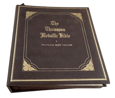 Lot 314 - FRANKLIN MINT; 'The Thomason Medallic Bible',...