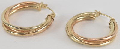 Lot 1517 - A pair of 9ct yellow gold twist earrings,...