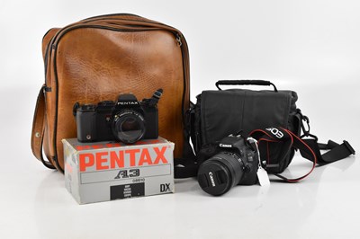 Lot 2495 - CANON; an EOS 100D camera, fitted in case,...