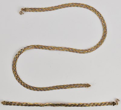 Lot 1406 - A 9ct tricolour gold semi-rigid necklace,...