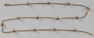 Lot 1389 - A 9ct yellow gold necklace, with thirteen orbs,...
