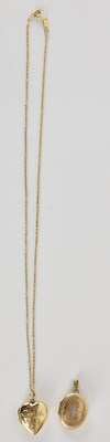 Lot 1461 - A 9ct gold oval double locket, length 2.3cm,...