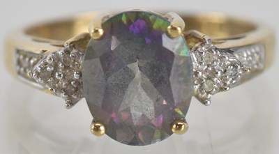 Lot 1337 - A 9ct gold dress ring, with claw set cut oval...