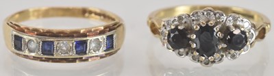 Lot 1340 - A 9ct gold ring set with four cushion cut...