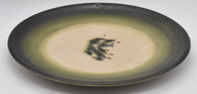 Lot 241 - MICHAEL LEACH; a slipware plate, stamped on...
