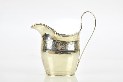 Lot 1293 - A Georgian hallmarked silver cream jug,...